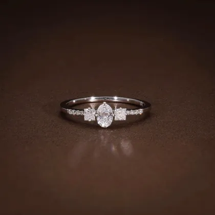 Three-Stone Oval & Princess Diamond Engagement Ring